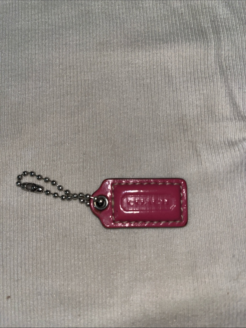 Coach Patent Leather Tag in Fuchsia